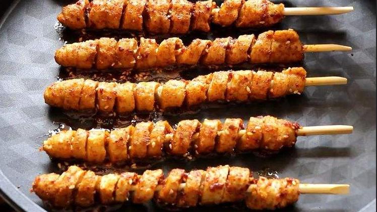 革新烘焙工艺,引领行业新潮流,最新烤面筋机亮相!